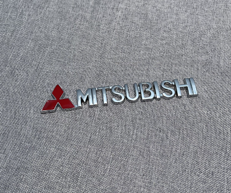 Suitable for Mitsubishi Xinjinxuan ASX Wing God Lance Ling Shuai Ling Yue V3EVO grille modification metal car sticker logo